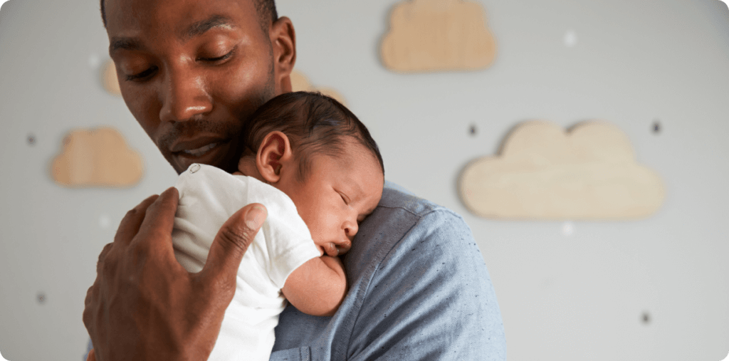 Father cuddling child