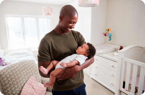 Father holding baby