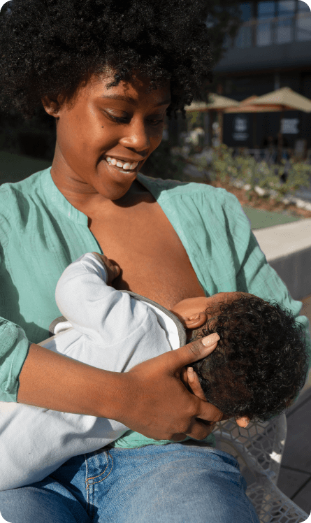 Woman breastfeeding in a public place